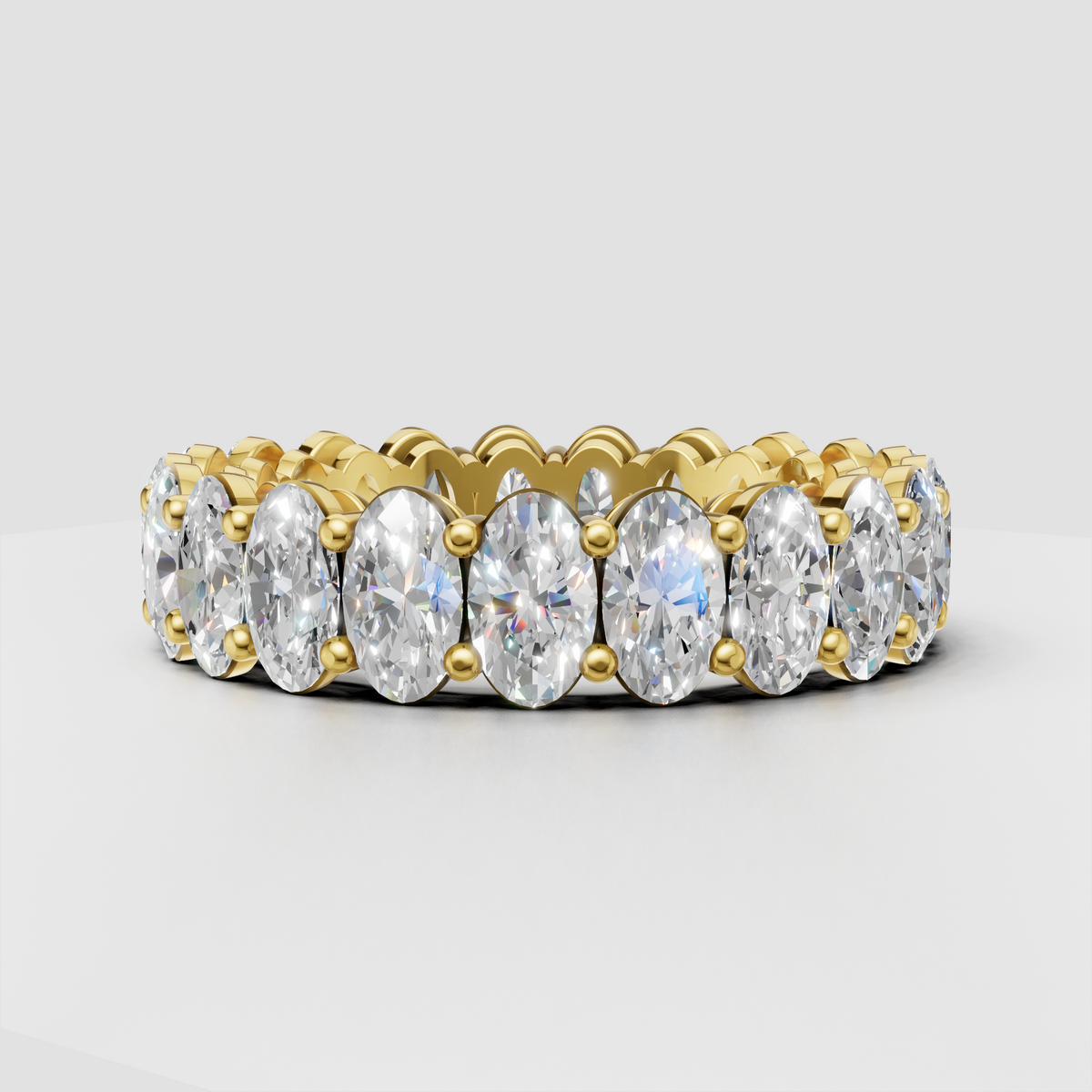 Oval diamond eternity band ring with prong setting