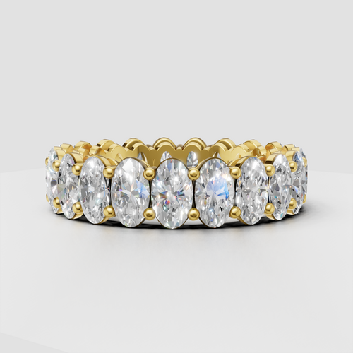 Oval diamond eternity band ring with prong setting
