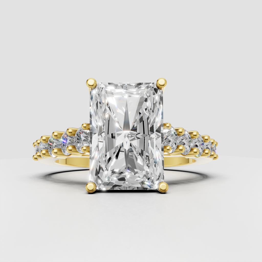 Radiant cut diamond crossover engagement ring in polished yellow gold