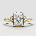 Radiant cut diamond engagement ring with beaded halo and yellow gold band