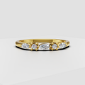 Yellow gold round and marquise diamond wedding ring with prong settings