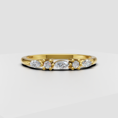 Yellow gold round and marquise diamond wedding ring with prong settings