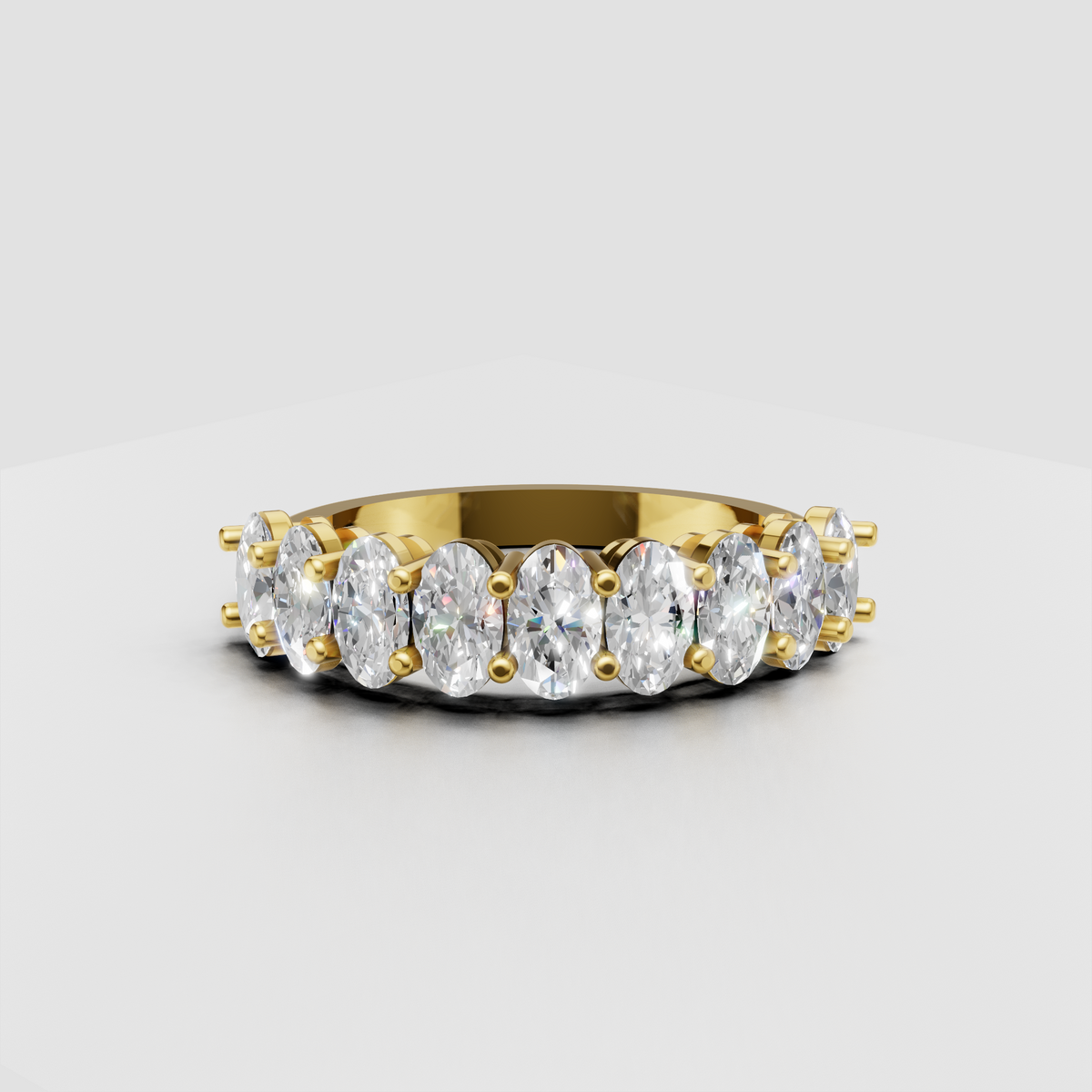Oval diamond full eternity band ring in polished yellow gold with shared prong setting