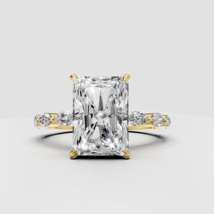 Radiant cut diamond engagement ring with pavé and marquise accents