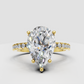 Pear cut diamond ring with hidden halo
