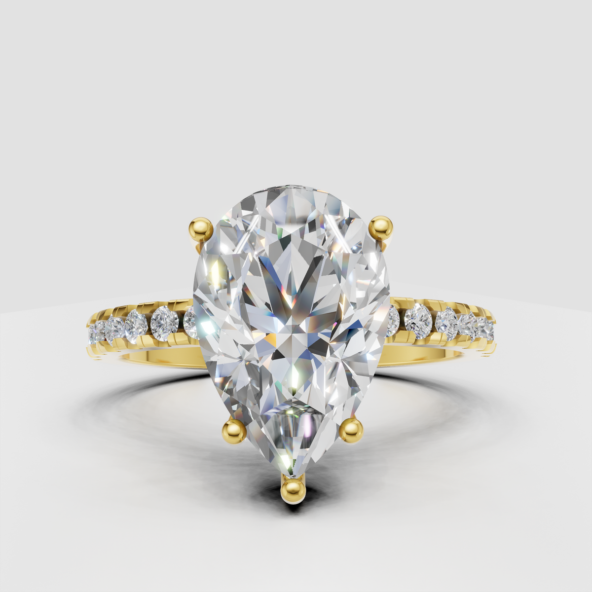 Pear cut diamond ring with hidden halo