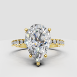 Pear cut diamond ring with hidden halo