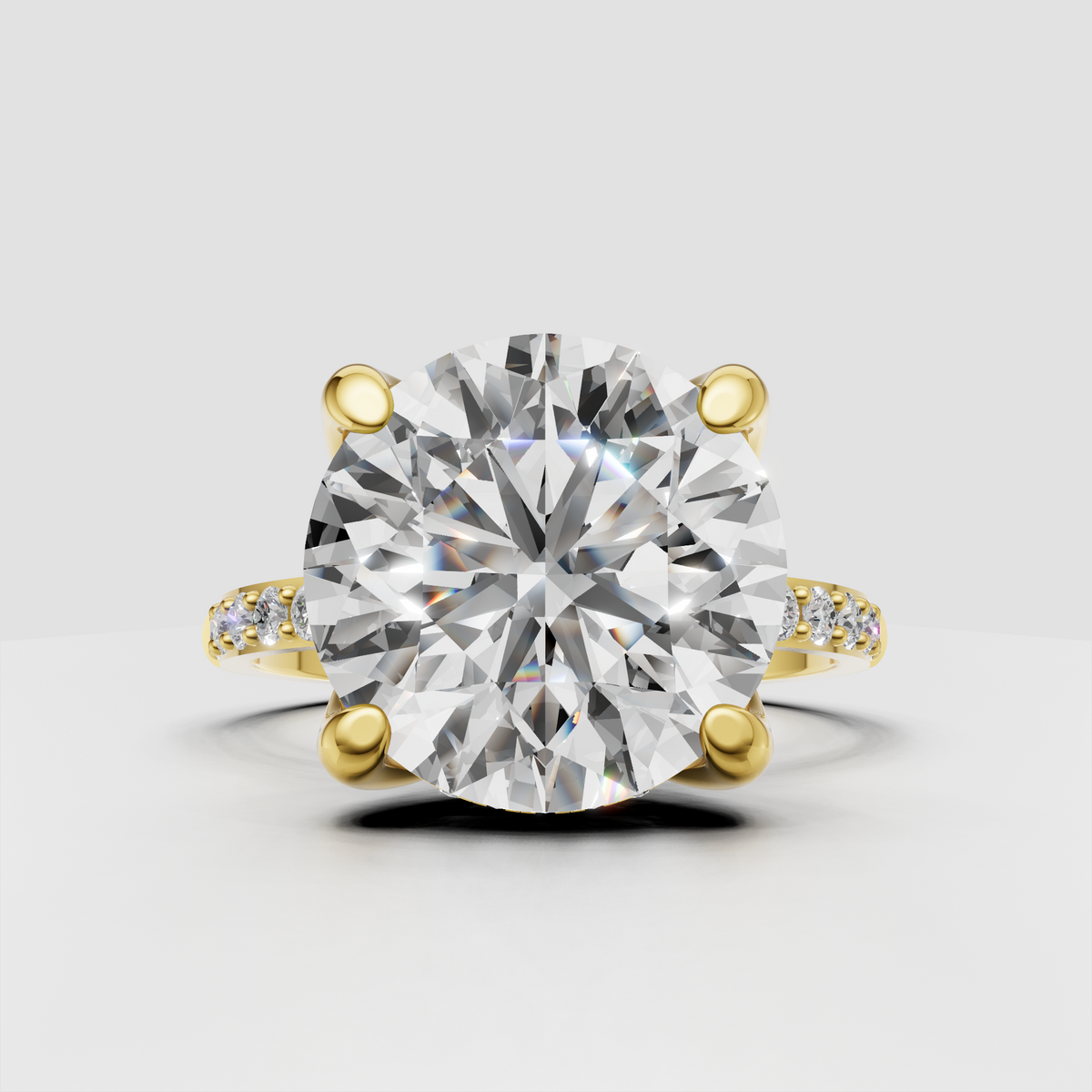 Round diamond six-prong engagement ring in polished yellow gold