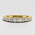 Round and pear cut diamond half eternity wedding band in polished yellow gold