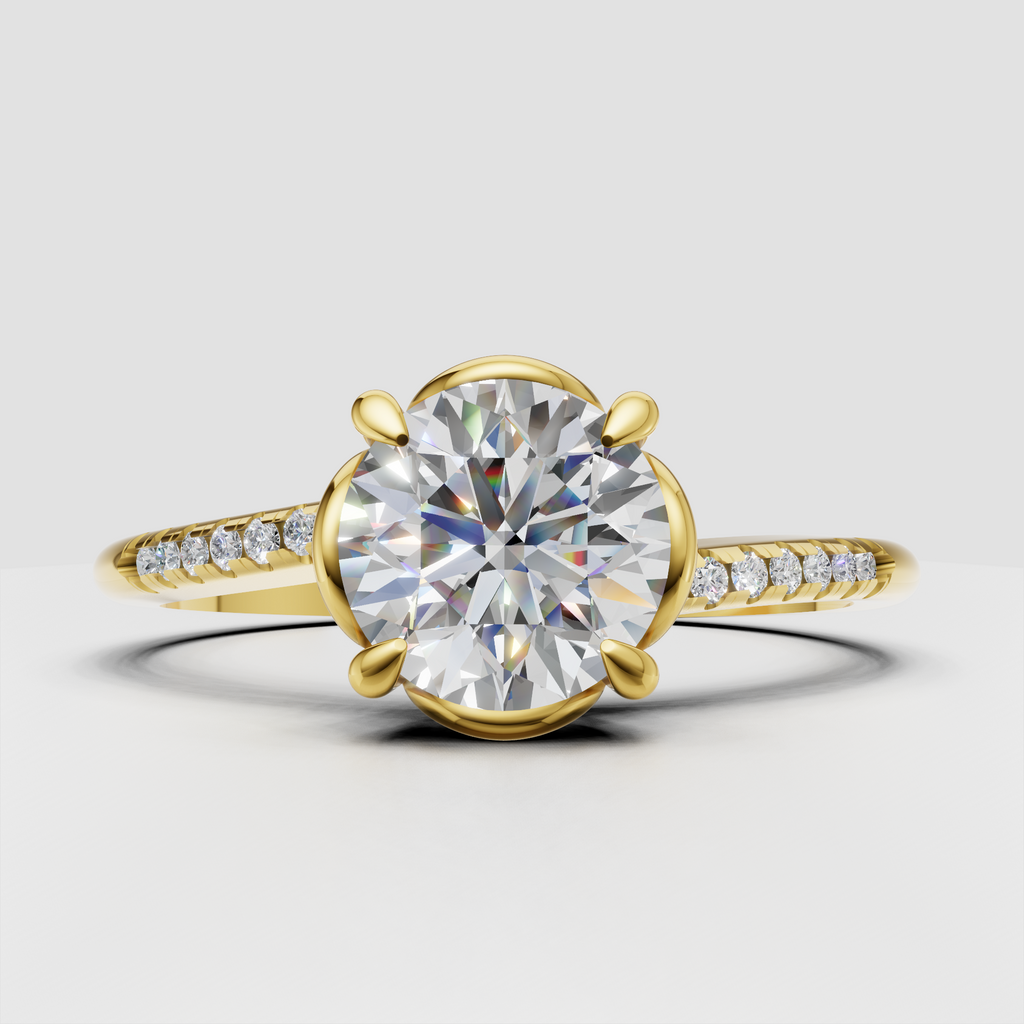 Round cut diamond ring with open halo-inspired setting