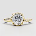 Round cut diamond ring with open halo-inspired setting
