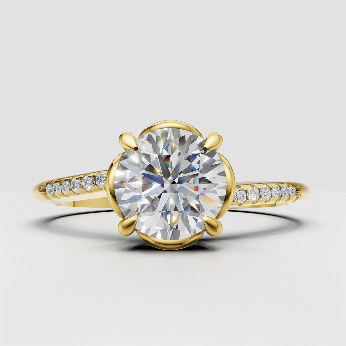 Round cut diamond ring with open halo-inspired setting