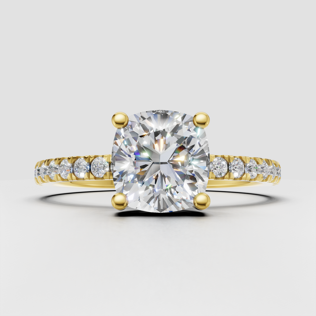 Cushion diamond cathedral pavé engagement ring in yellow gold