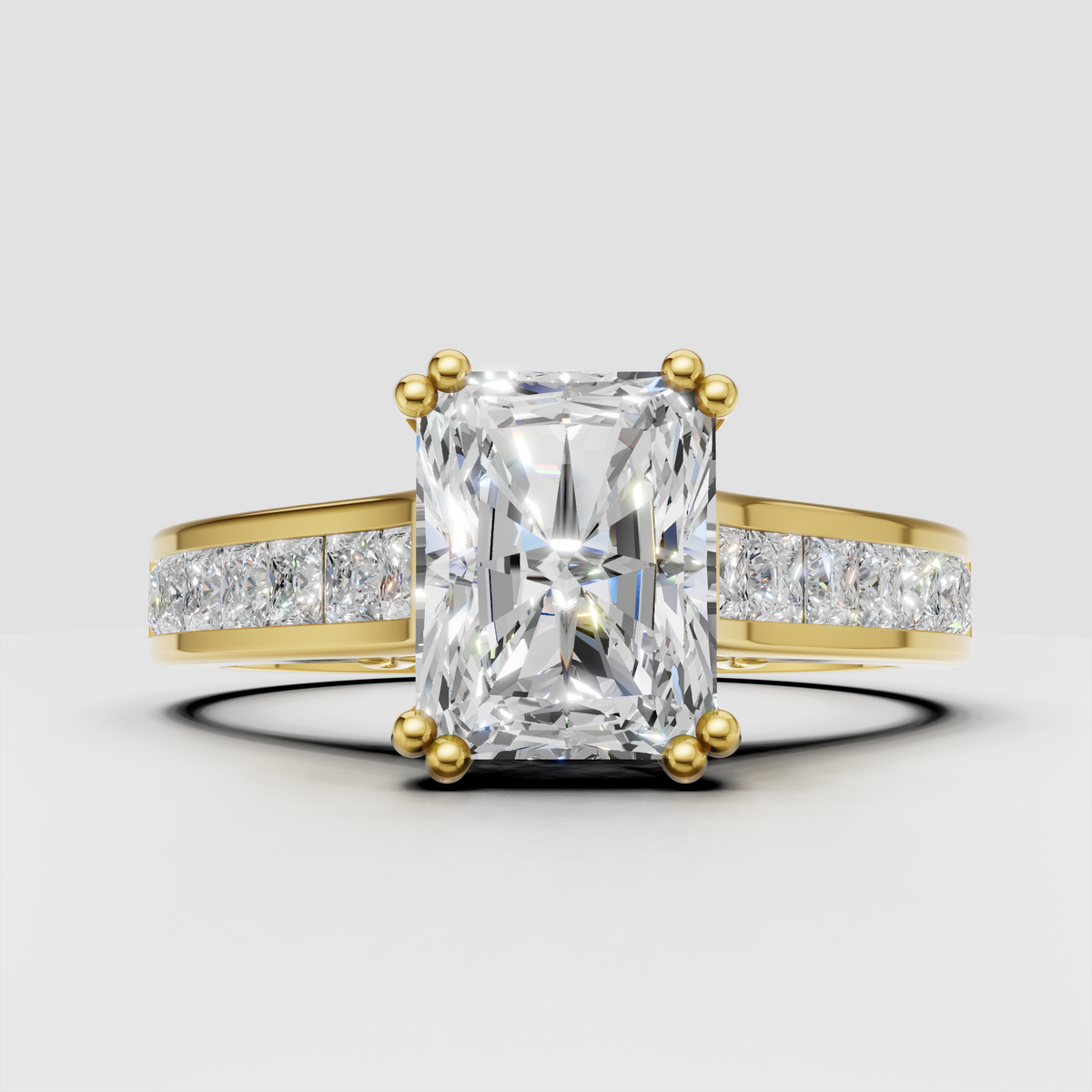 Radiant cut diamond engagement ring in yellow gold