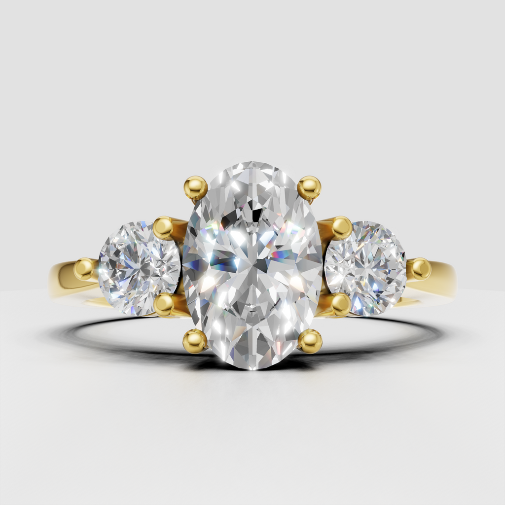 Oval diamond three stone vintage filigree engagement ring in yellow gold