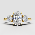 Oval diamond three stone vintage filigree engagement ring in yellow gold