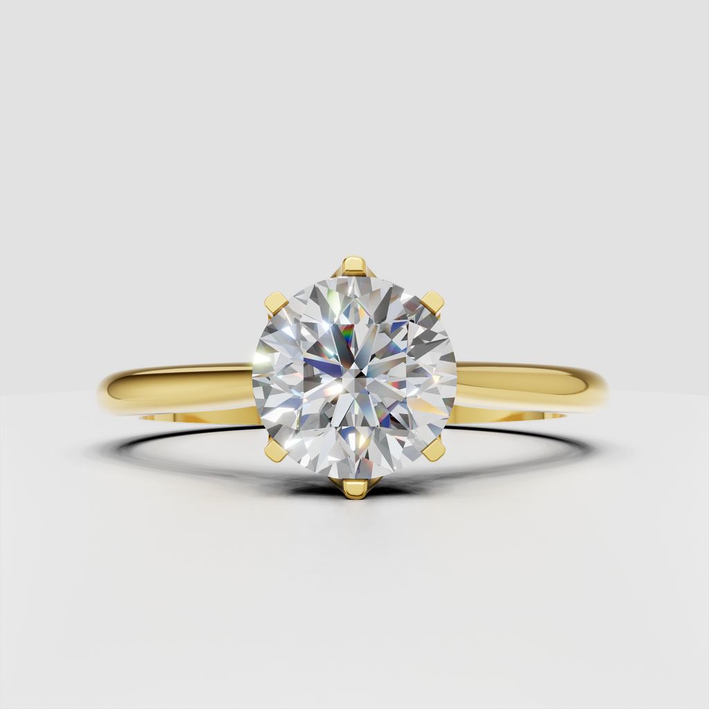 Round cut diamond engagement ring in yellow gold