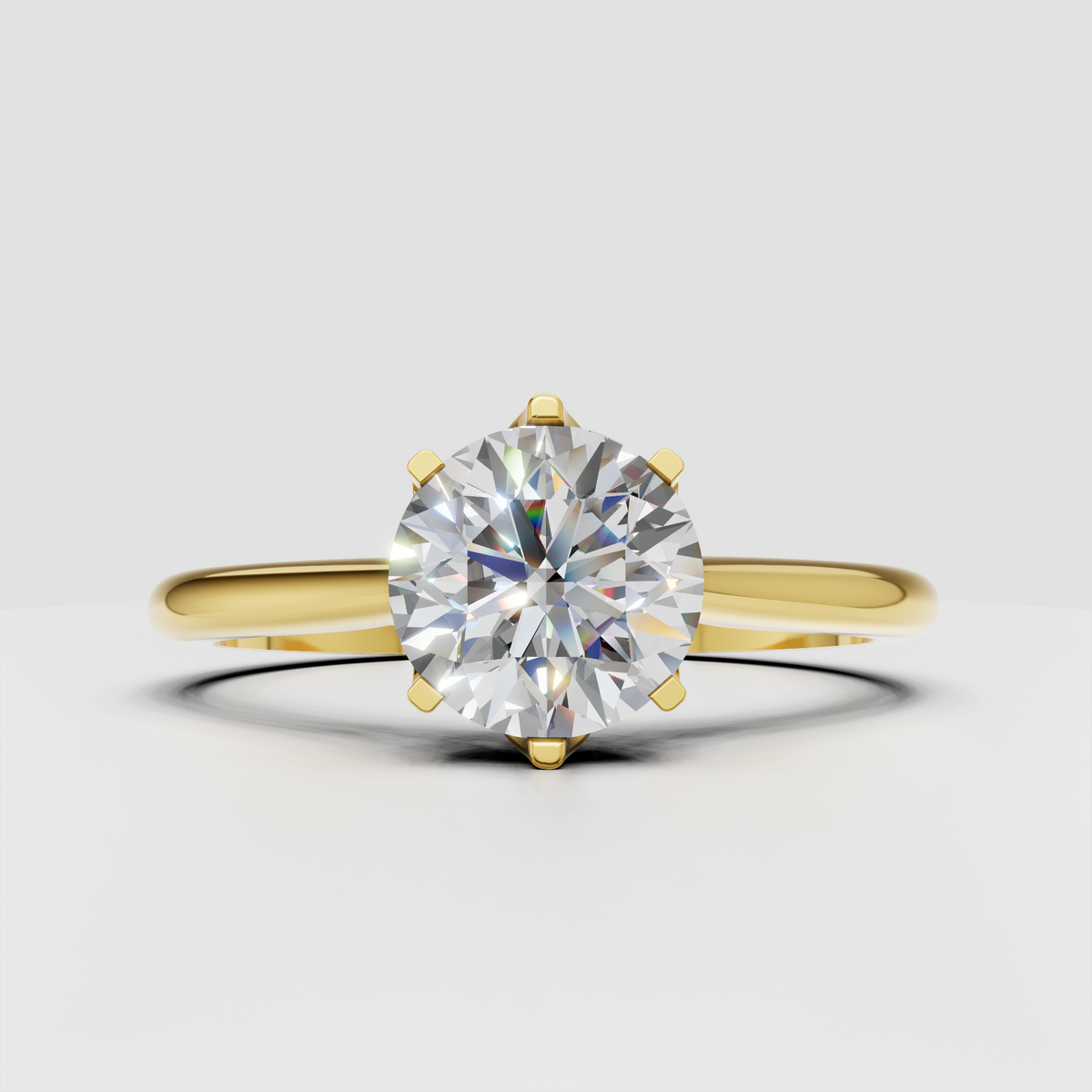 Round cut diamond engagement ring in yellow gold