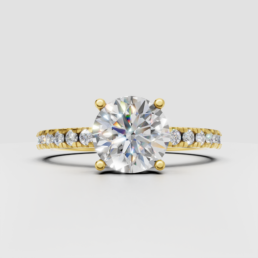 Round diamond pavé solitaire engagement ring in yellow gold