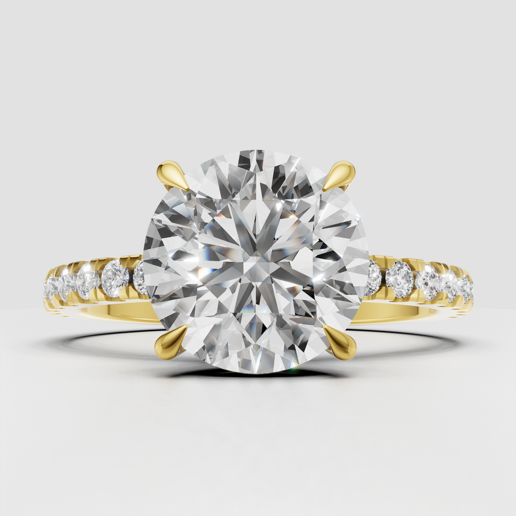 Round cut diamond engagement ring in yellow gold