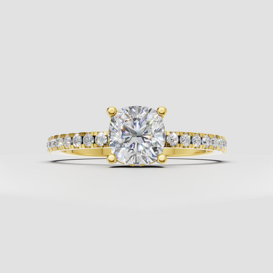 Cushion diamond hidden halo engagement ring with pave band in yellow gold