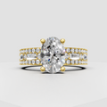 Oval diamond engagement ring with four-prong setting and three-row baguette and round stone band
