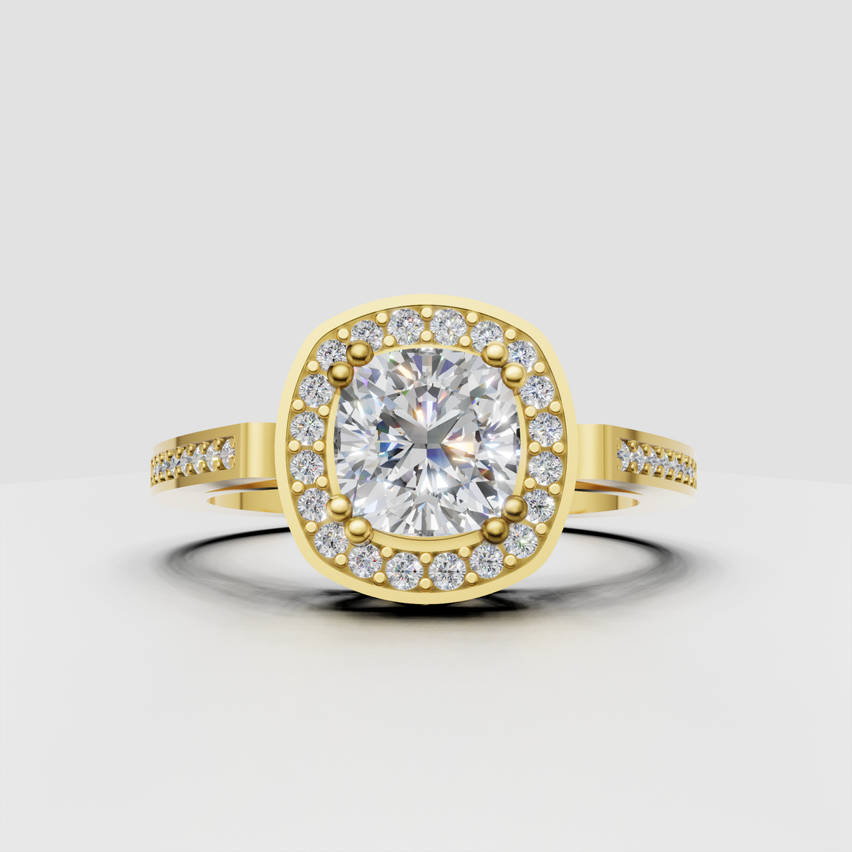 Cushion diamond halo engagement ring with pavé diamond accent band in yellow gold