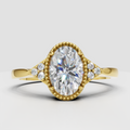 Oval diamond classic engagement ring with beaded halo