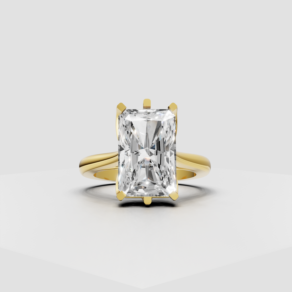 Radiant-cut diamond solitaire engagement ring with polished yellow gold split-shank band