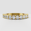 Round cut diamond half eternity wedding band in polished gold