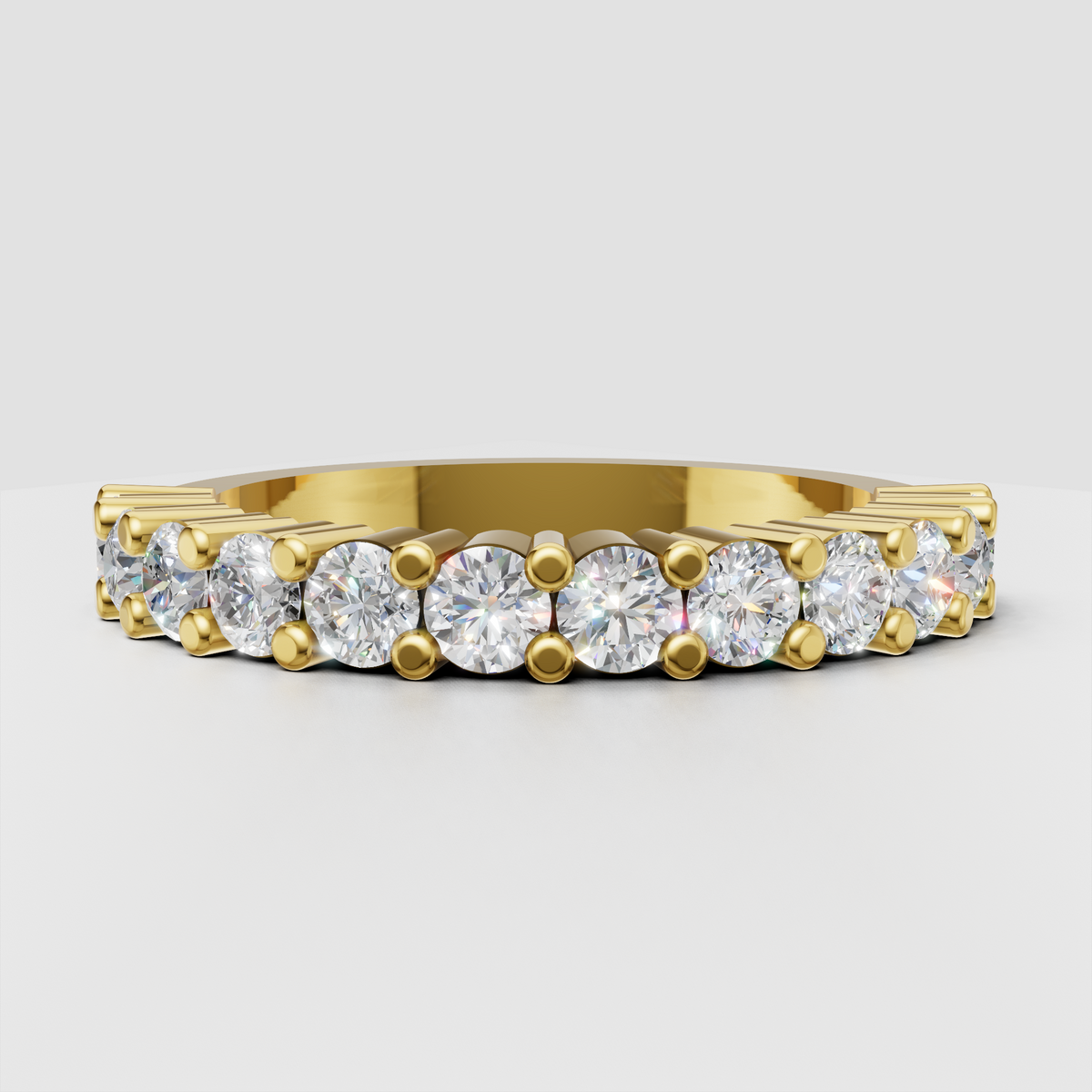 Round cut diamond half eternity wedding band in polished gold