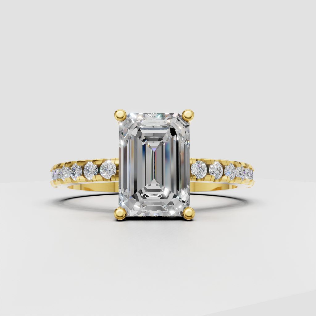 Emerald diamond four-prong pavé engagement ring in yellow gold