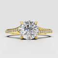 Round diamond pavé engagement ring with polished yellow gold band
