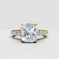 Cushion cut diamond vintage engagement ring in polished yellow gold