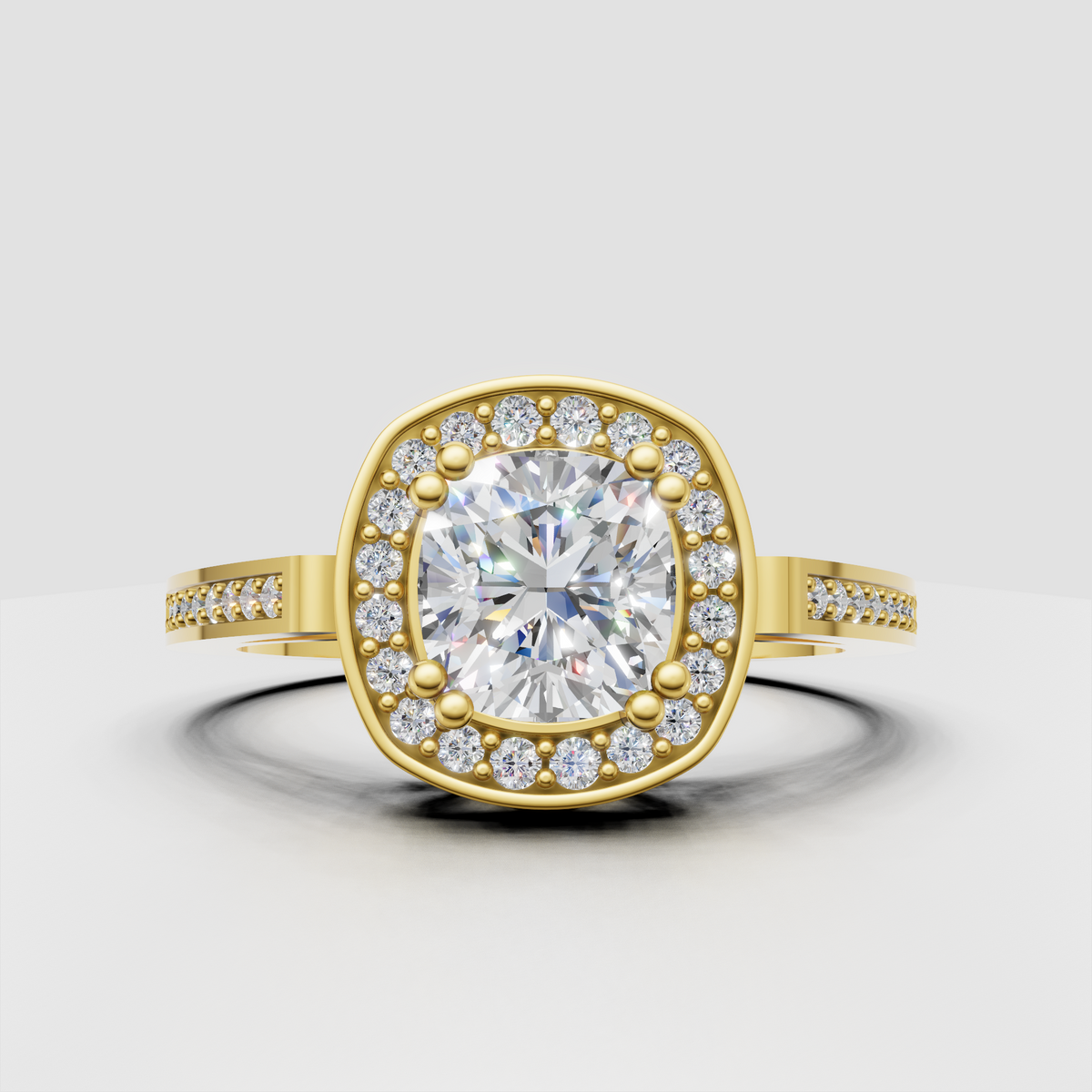 Cushion cut diamond halo engagement ring with polished yellow gold band