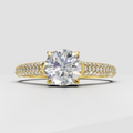 Round cut Diamond engagement ring in polished yellow gold