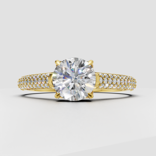 Round cut Diamond engagement ring in polished yellow gold
