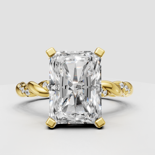 Radiant cut diamond twisted pavé engagement ring in yellow gold