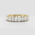Oval cut diamond full eternity wedding band in polished yellow gold
