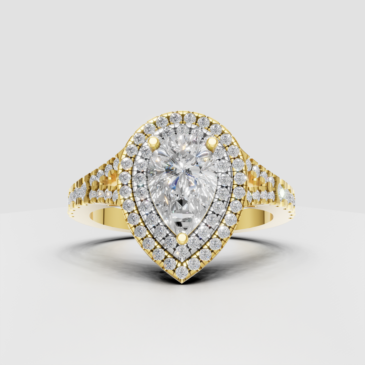 Pear-shaped Diamond double halo engagement ring in polished yellow gold with pavé band