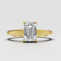 Emerald cut diamond solitaire engagement ring with split shank band