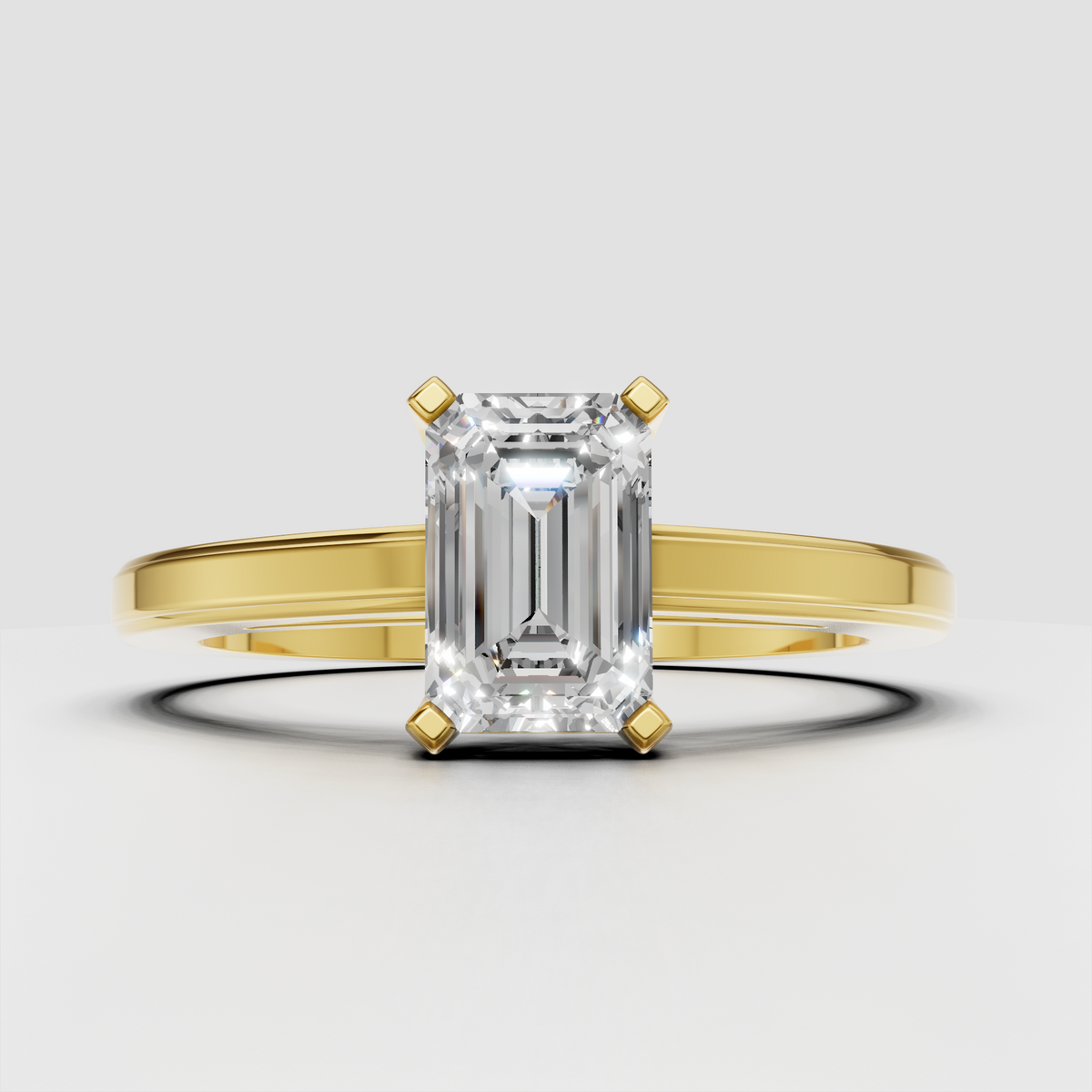 Emerald cut diamond solitaire engagement ring with split shank band