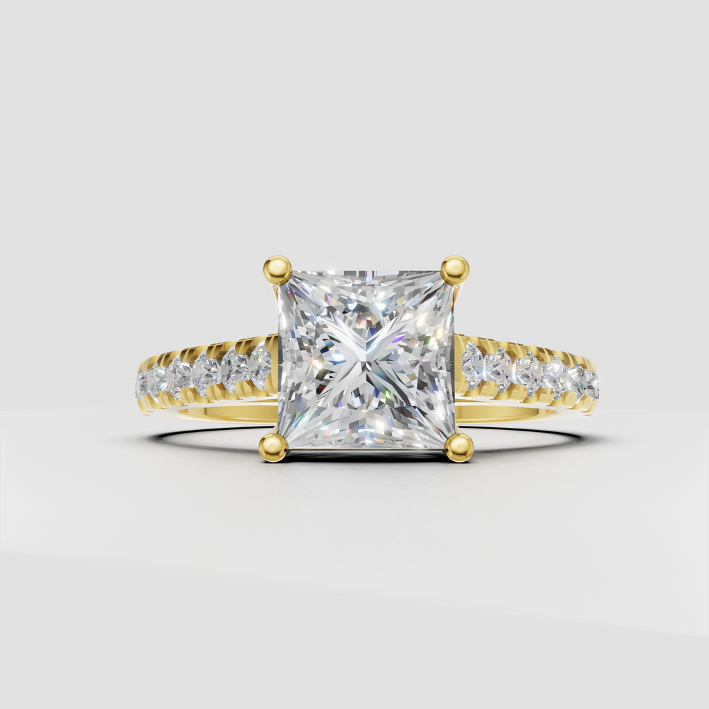Princess cut diamond engagement ring with four prong yellow gold setting