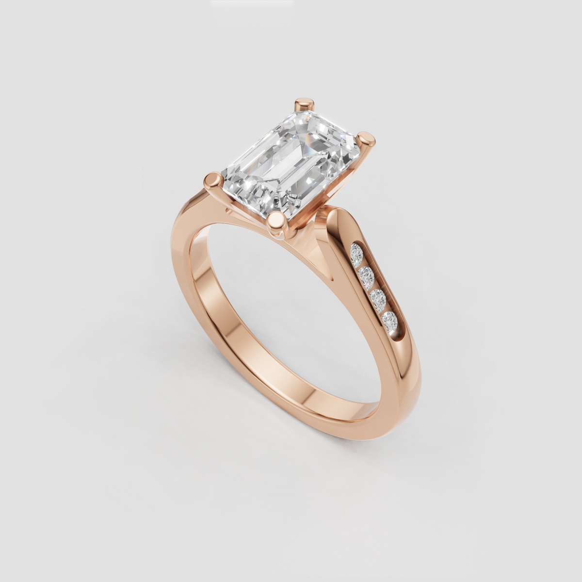 Side view of emerald cut engagement ring showing the elevated setting.