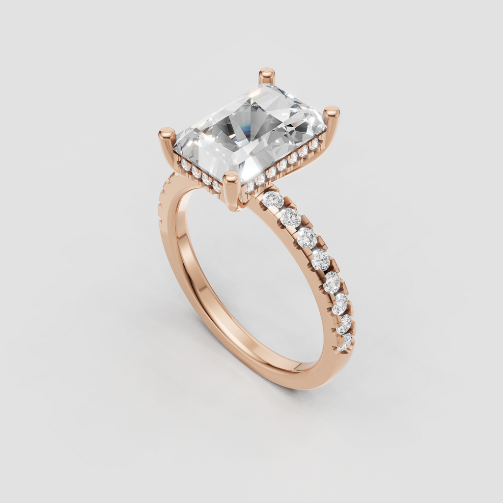 Radiant cut engagement ring with prong-set center stone and hidden halo