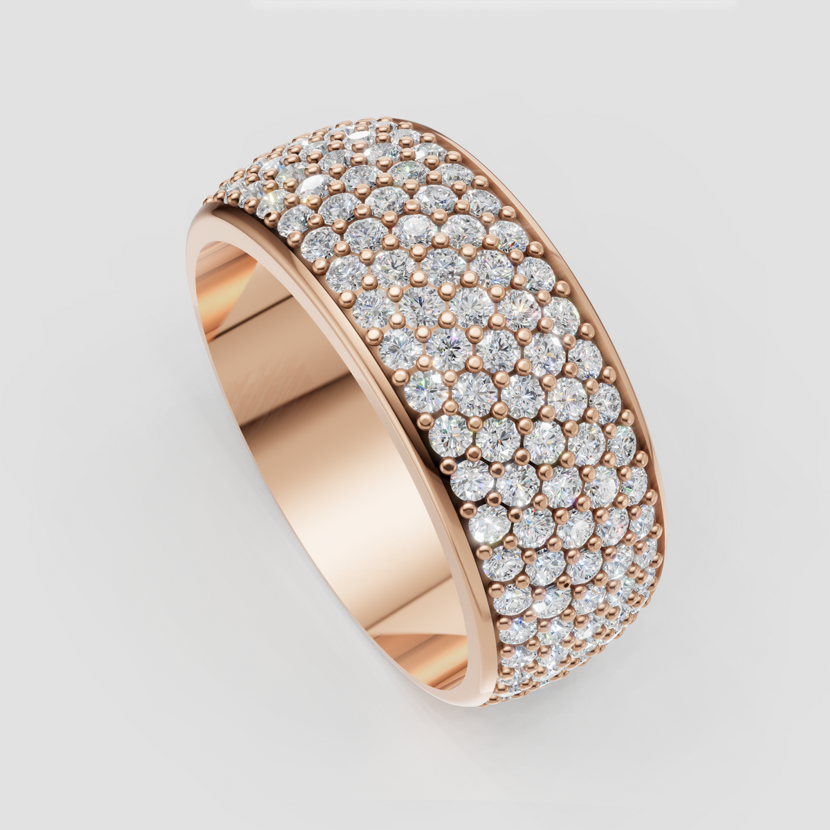 Close-up of wide yellow gold round diamond pavé eternity band