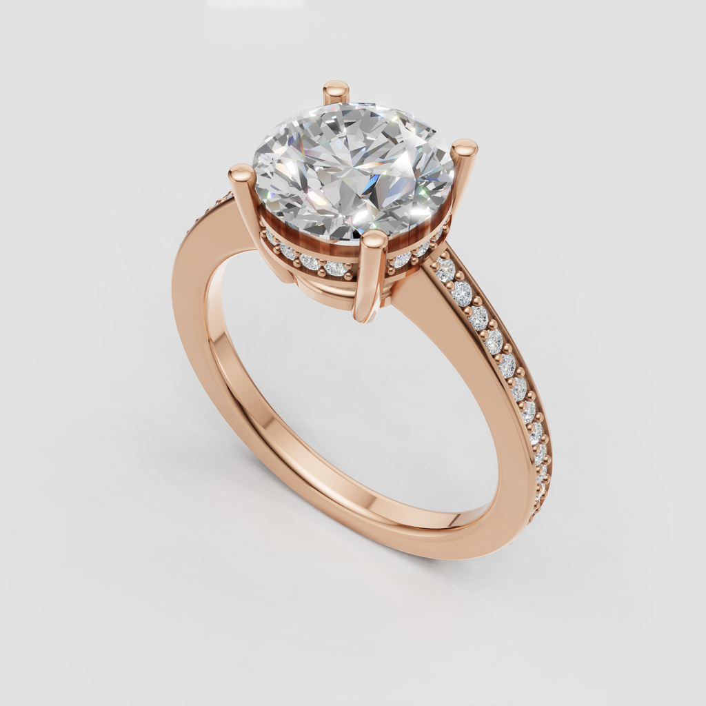 Refined round diamond solitaire engagement ring with sparkling pavé shoulders.