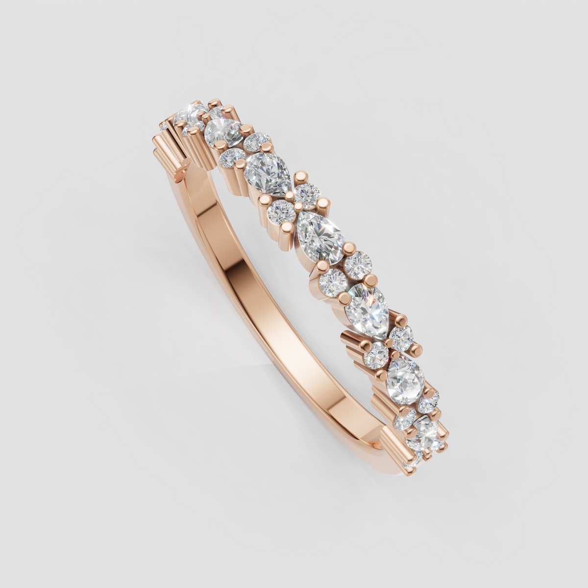 Contemporary diamond wedding band with round and pear cut gemstones