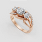 Round diamond three stone ring with sculptural curved band