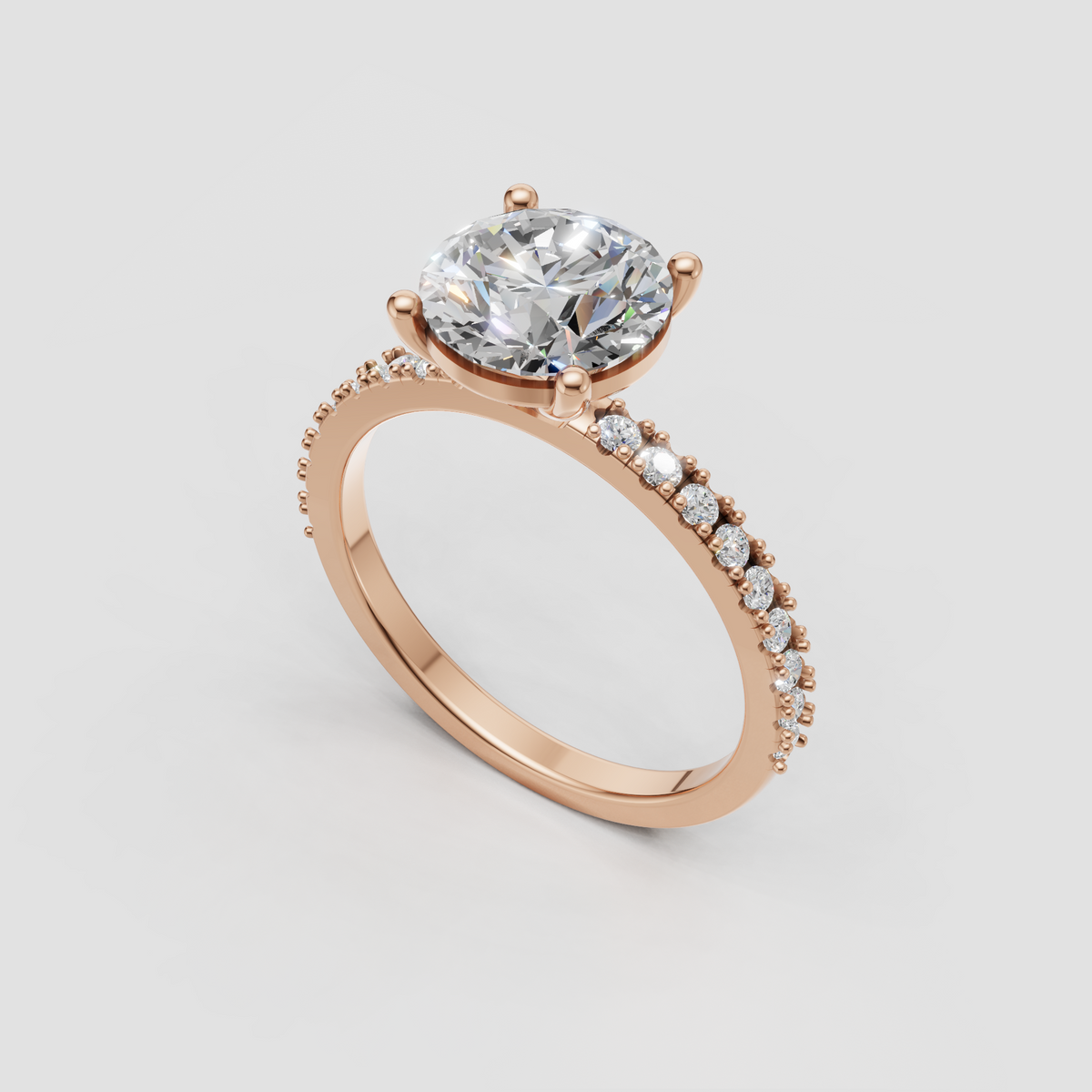 Round diamond engagement ring with round diamond shoulder accents